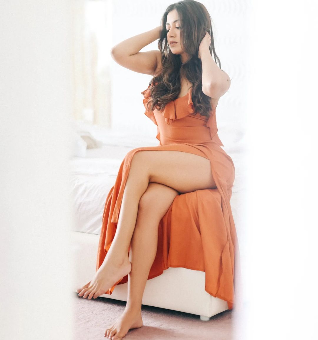 Kollywood Actress Catherine Tresa Long Legs Show in Orange Gown